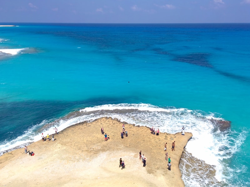 The natural rock arch and turquoise lagoon at Agiba beach west of Marsa Matruh